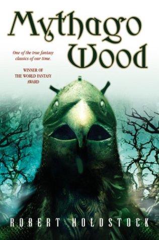 Cover of the Tor Books 2003 edition of Mythago Wood by Robert Holdstock, showing a masked, antlered figure emerging from dark green woodland.